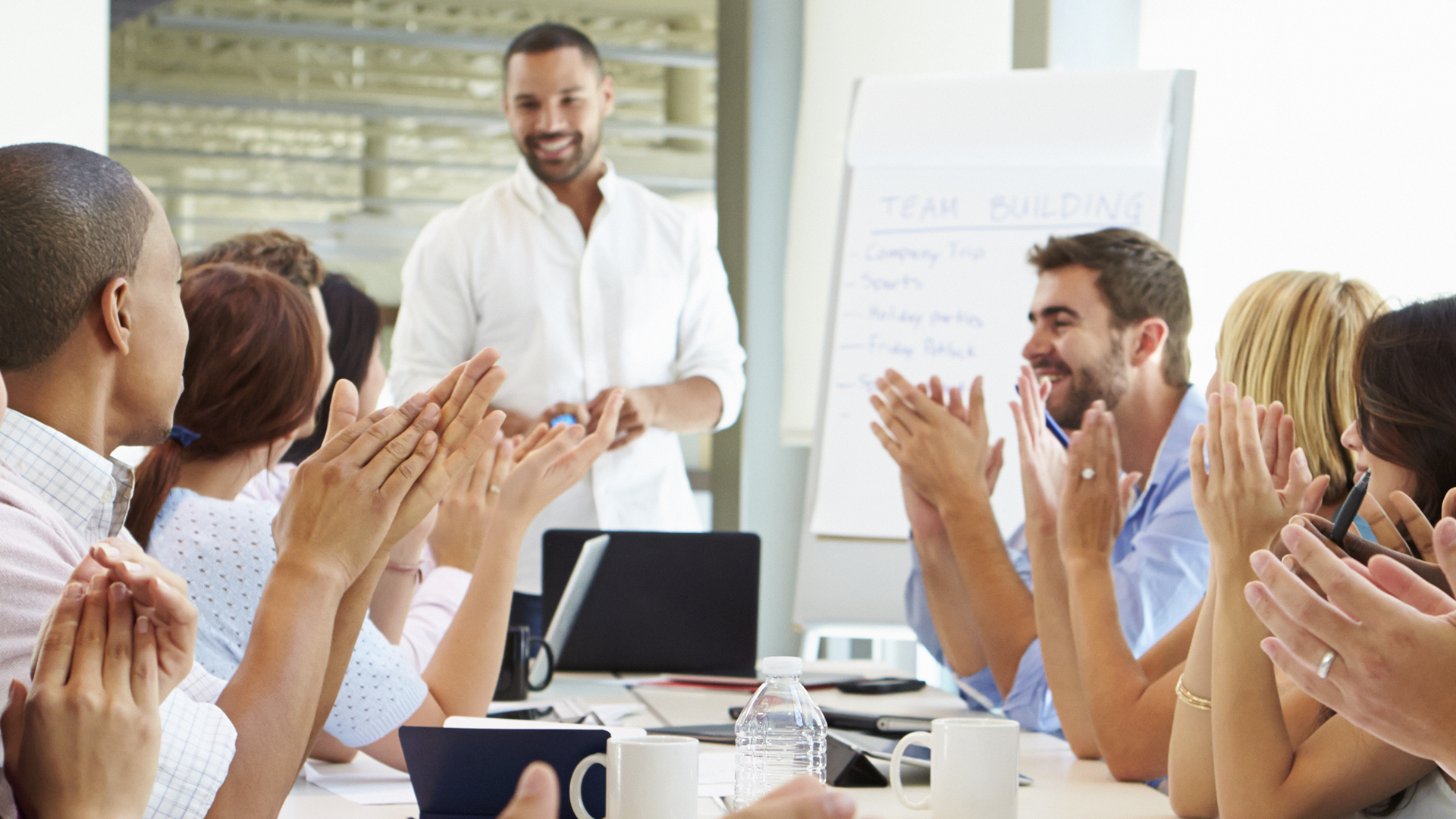 image of parents and staff discussing enrollment